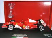 Ferrari 248 F1 GP Monza 90i&egrave;me victoire Edition num&eacute;rot&eacute;e avec figurine  1/18