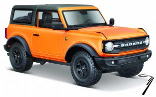 Ford . Jaune orang�  - Boite d�fectueuse, mod�le intact 1/24